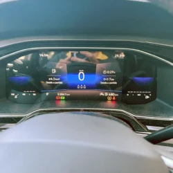 Digital car instrument cluster: central speed reads 0 km/h, with time 14:04 and outside temp 29.5°C; trip and range indicators visible below.